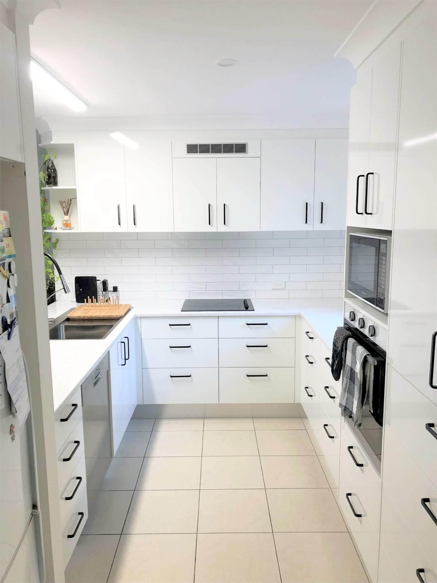 Kitchen With White Cabinets — Nyblad Construction in Caloundra West, QLD