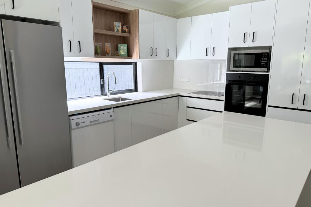Kitchen With White Cabinets — Nyblad Construction in Caloundra West, QLD