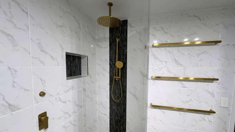 Bathroom With Marble Tiles — Nyblad Construction in Caloundra West, QLD