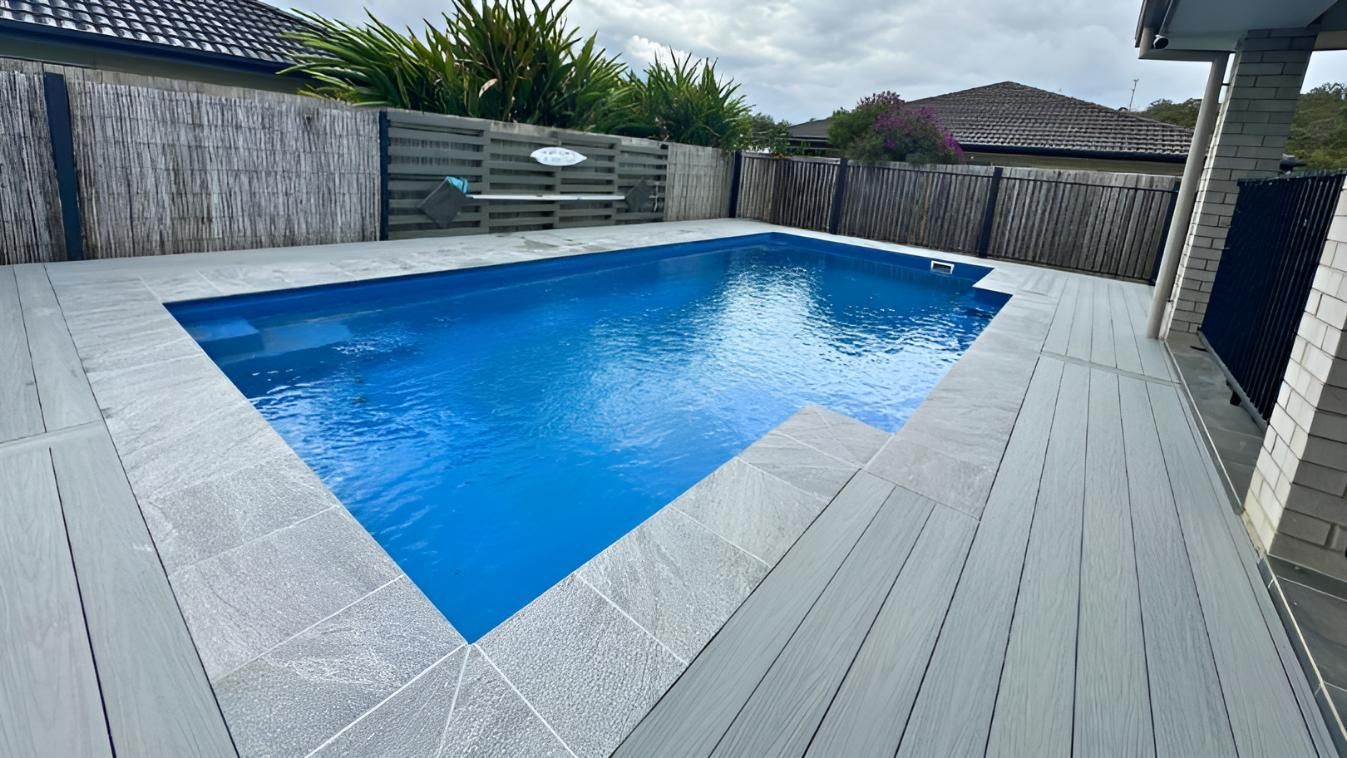 Large Swimming Pool is Sitting on Top of a Deck — Nyblad Construction in Caloundra West, QLD