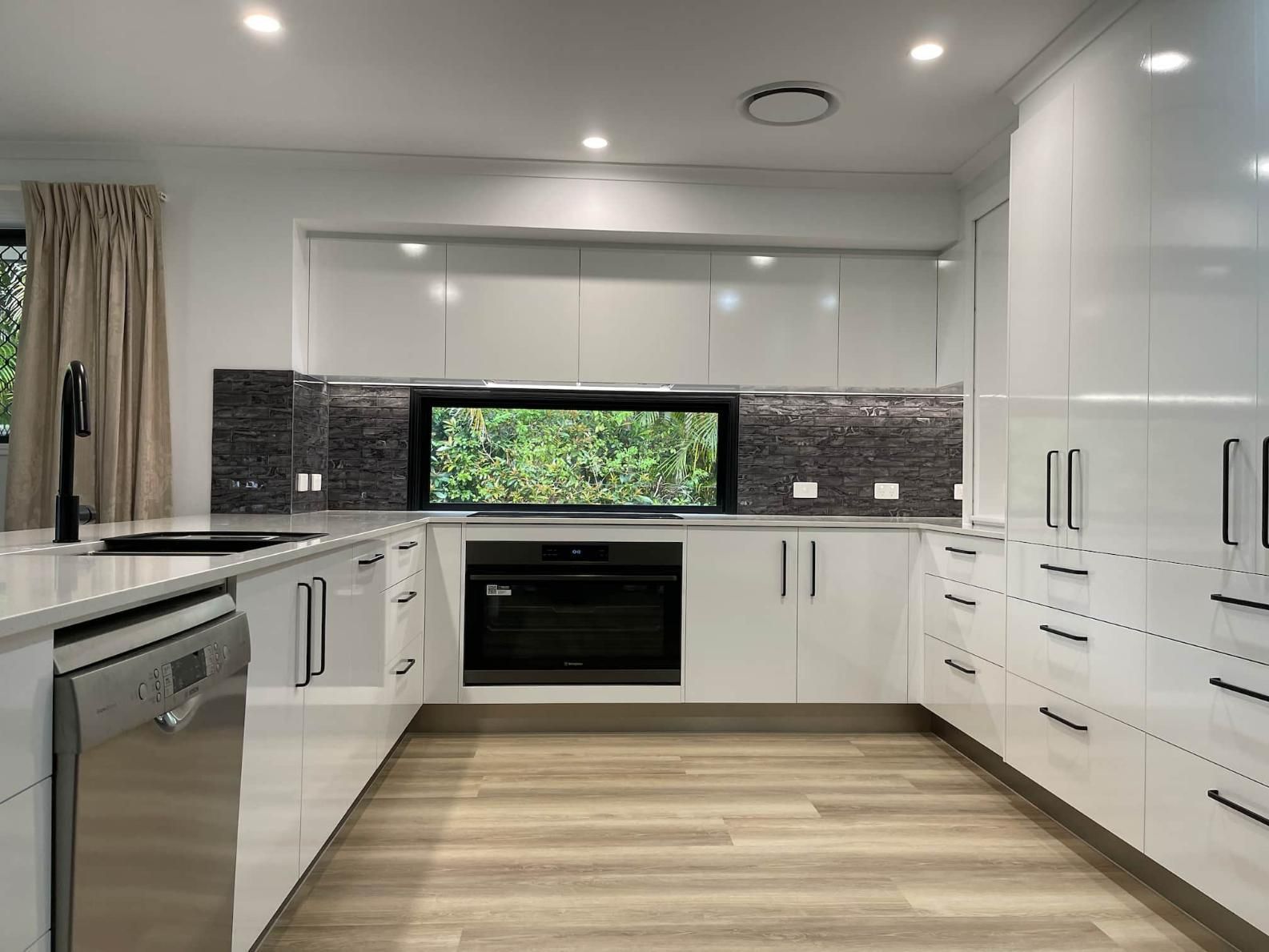 Kitchen With White Cabinets — Nyblad Construction in Caloundra West, QLD