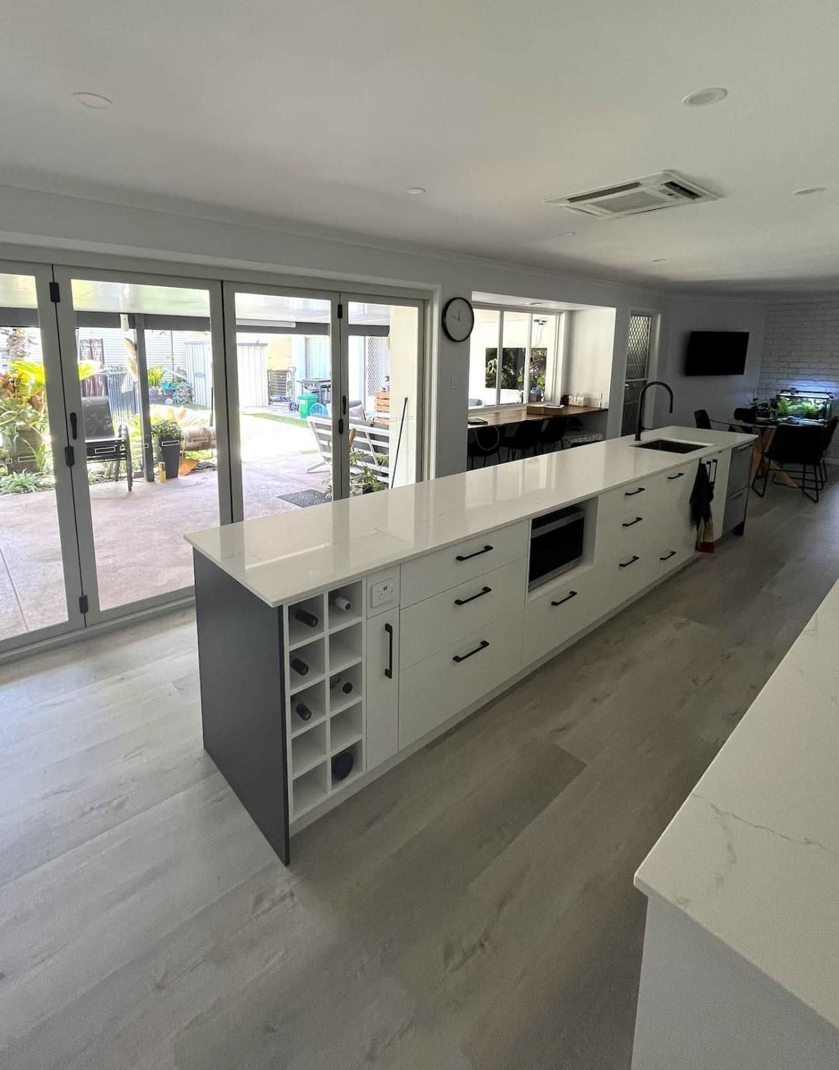 Kitchen With a Large Island and Lots of Windows — Nyblad Construction in Caloundra West, QLD