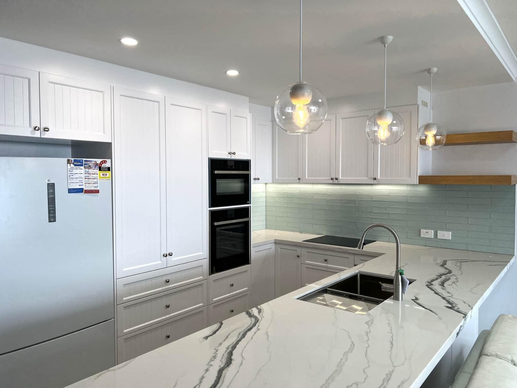 Kitchen With White Cabinets — Nyblad Construction in Caloundra West, QLD