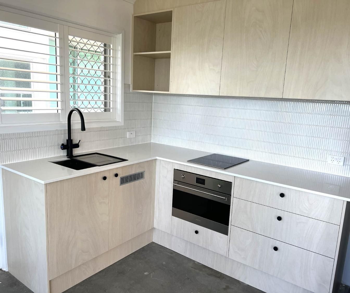 Kitchen With White Cabinets — Nyblad Construction in Caloundra West, QLD