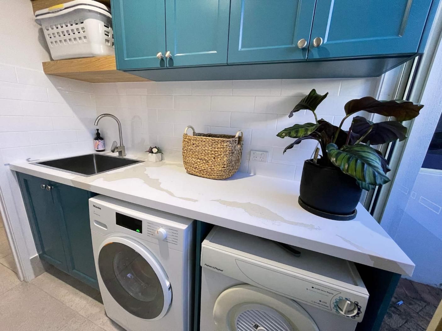 Laundry Room With a Washing Machine — Nyblad Construction in Caloundra West, QLD