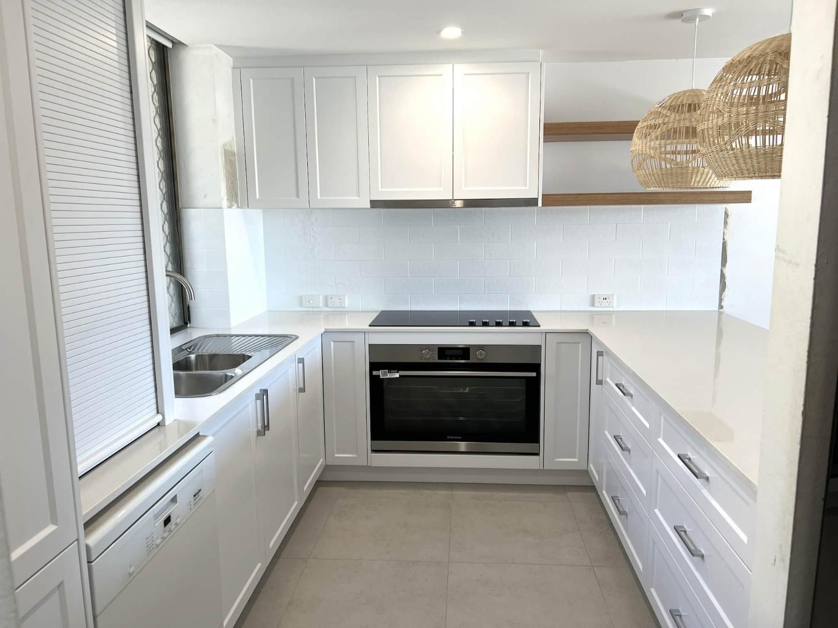 Kitchen With White Cabinets — Nyblad Construction in Caloundra West, QLD