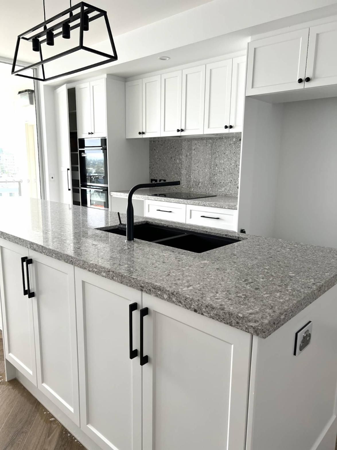 Kitchen With White Cabinets — Nyblad Construction in Caloundra West, QLD