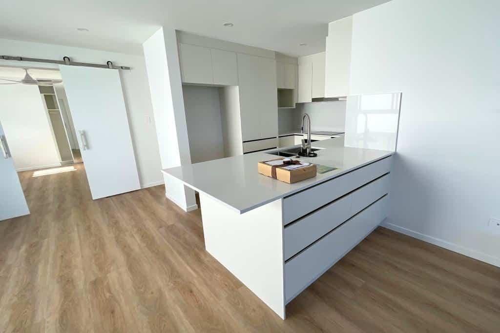 Kitchen With a Large Island in the Middle of the Room — Nyblad Construction in Caloundra West, QLD