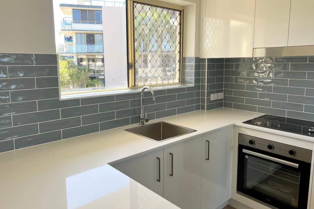 Kitchen With White Cabinets — Nyblad Construction in Caloundra West, QLD