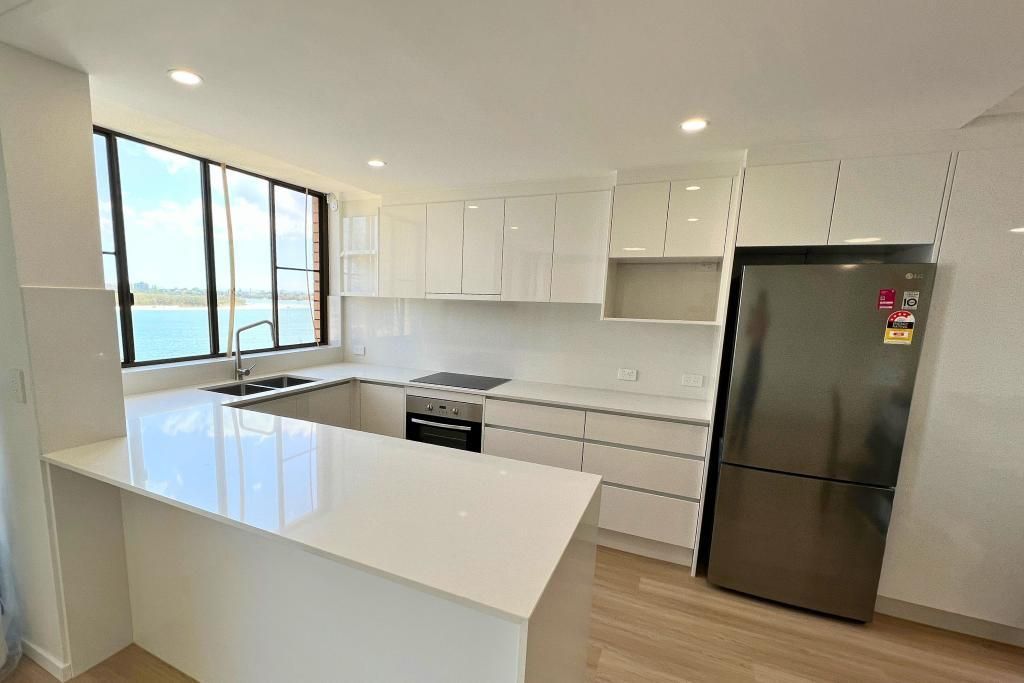 Kitchen With White Cabinets and a Stainless — Nyblad Construction in Caloundra West, QLD