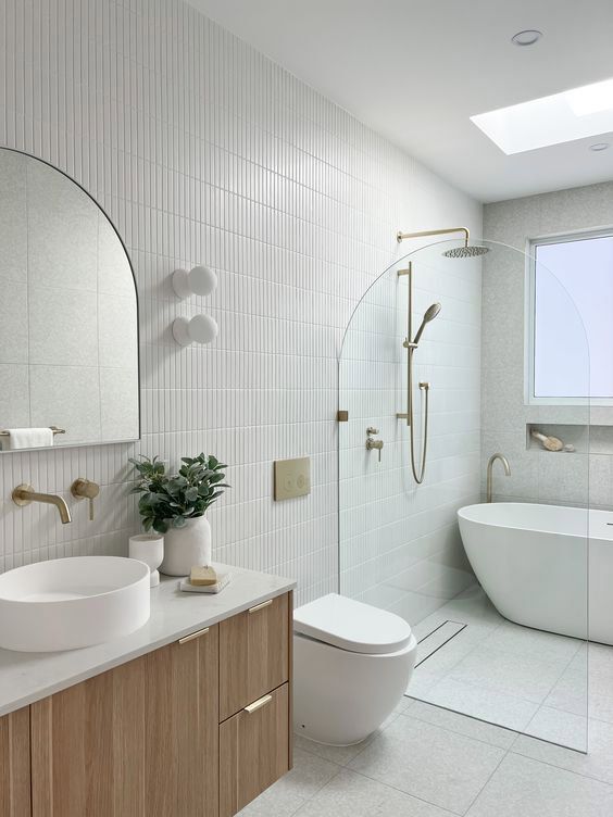 Bathroom With Wooden And White Walls And A Comfortable Bathtub — Nyblad Construction in Caloundra West, QLD