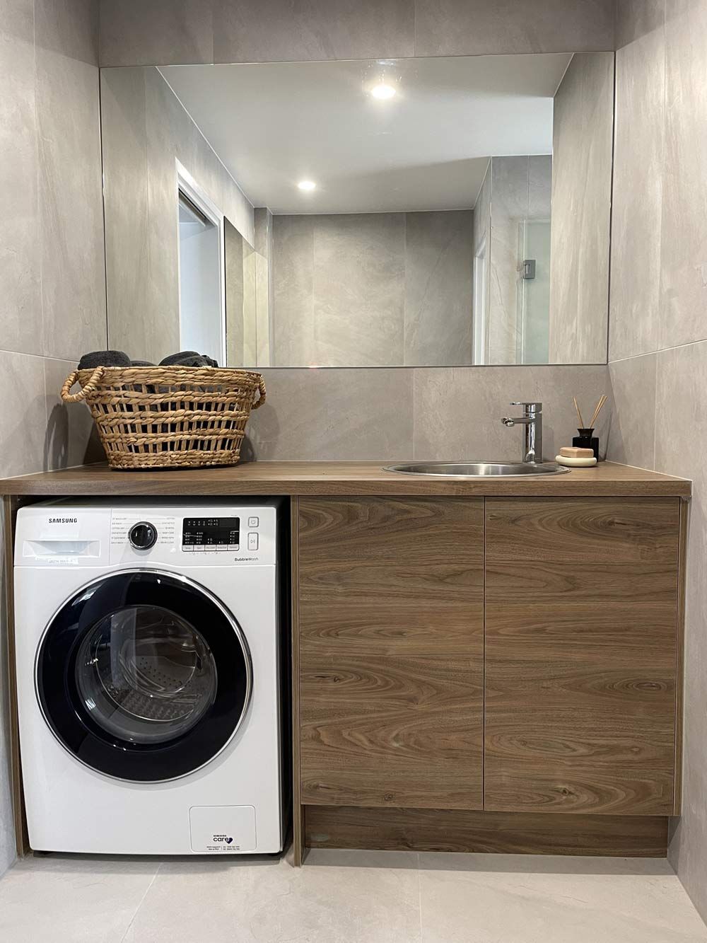 A Laundry Room With A Washing Machine And A Sink — Nyblad Construction in Caloundra West, QLD