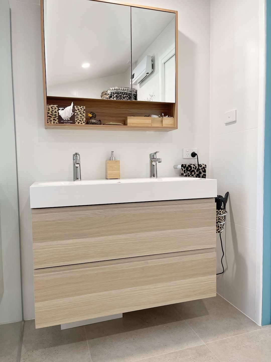 Bathroom With Two Sinks and a Mirror — Nyblad Construction in Caloundra West, QLD