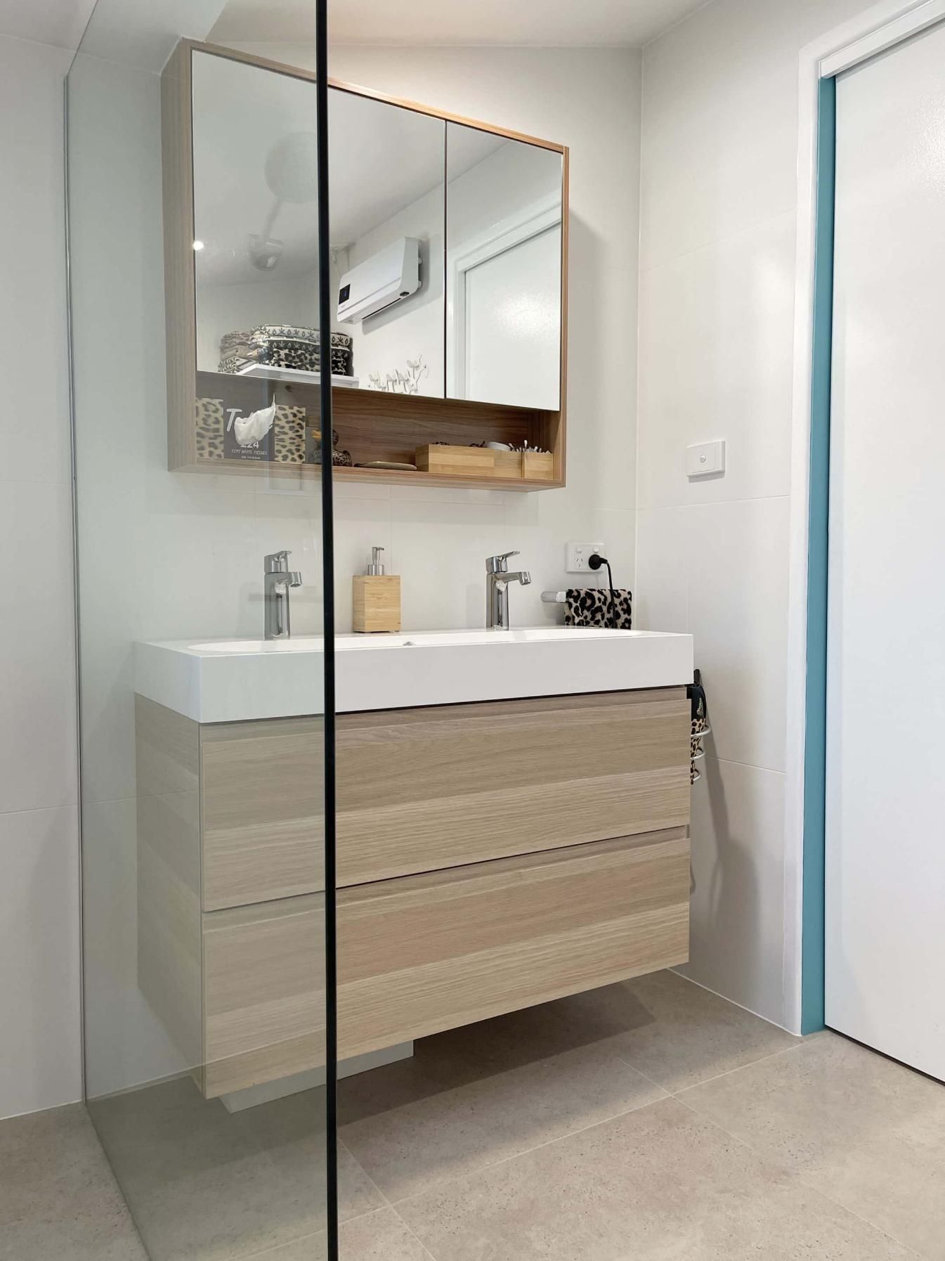 Bathroom With Two Sinks and a Walk in Shower — Nyblad Construction in Caloundra West, QLD