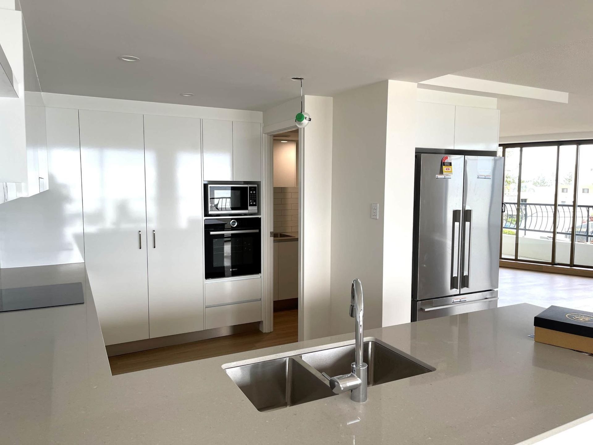 Kitchen With White Cabinets — Nyblad Construction in Caloundra West, QLD