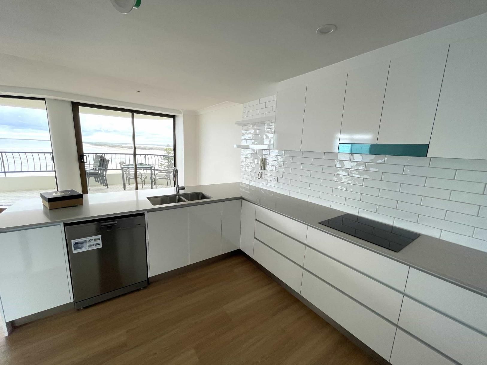 Kitchen With White Cabinets — Nyblad Construction in Caloundra West, QLD
