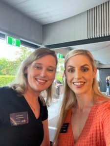 Two Women Are Smiling For A Picture In A Room — Nyblad Construction in Caloundra West, QLD