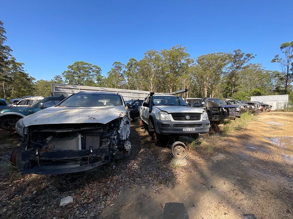 A Bunch Of Cars Are Parked In A Lot — Bago Auto Dismantlers in Lake Cathie, NSW