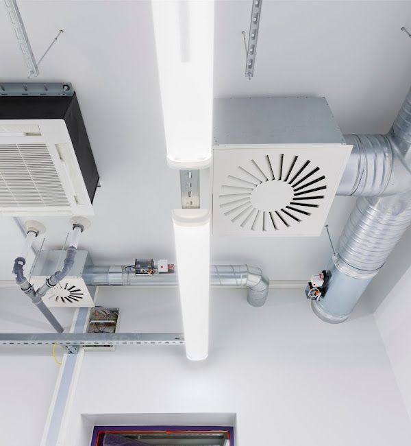 A ceiling with a fan and a light on it