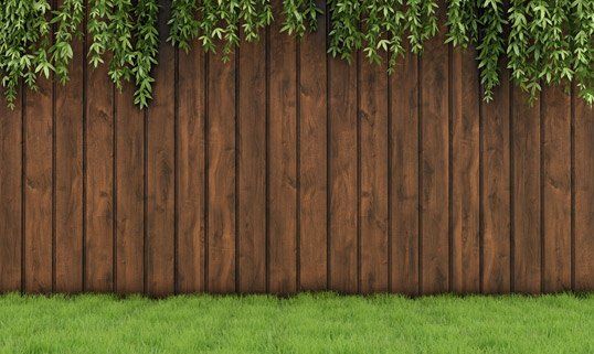Wooden Fence ─ Wood Fence in the Yard in Grand Rapids, MI