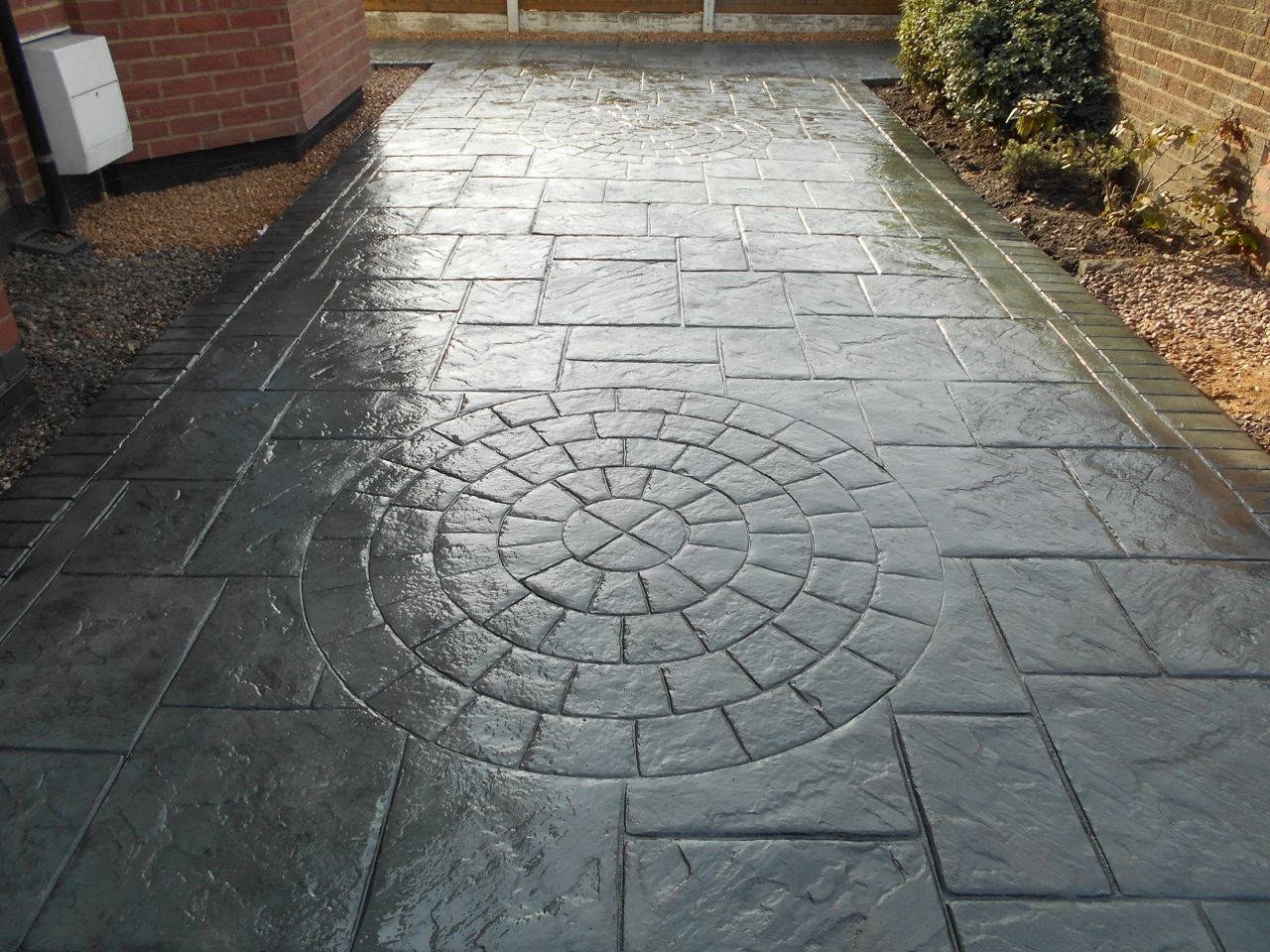 Pattern Imprinted Concrete Grand Ashlar with Stone Circle detail 