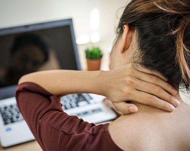 Woman Suffers from Neck Pain — Rose Hill, KS — Rose Hill Chiropractic