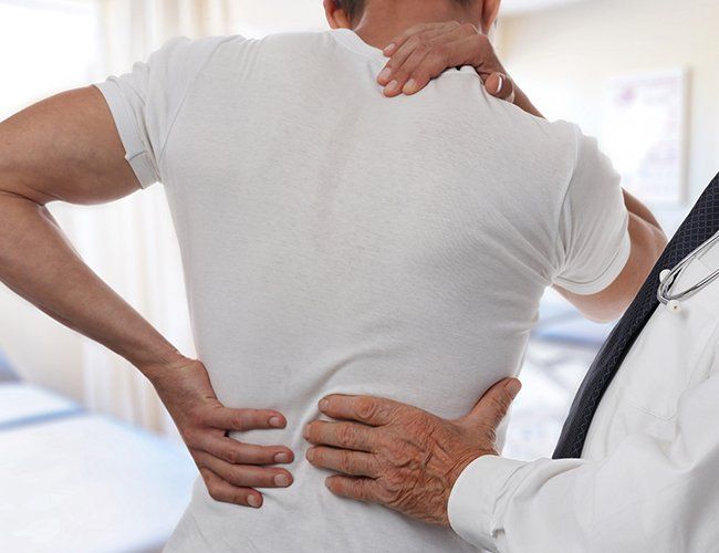 Man on Back Pain Check-up — Rose Hill, KS — Rose Hill Chiropractic