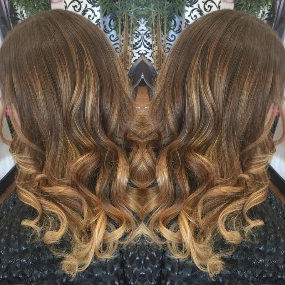 A Reflection of a Womans Hair in a Mirror — Choo Choo Hair and Beauty In Wyong, NSW