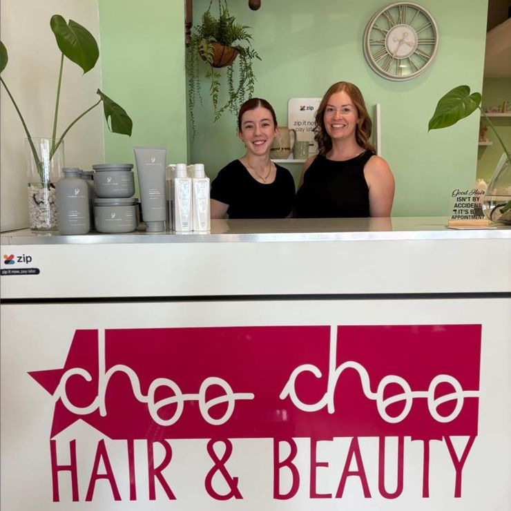 A Woman With Purple and Blue Hair is Reflected in a Mirror — Choo Choo Hair and Beauty In Wyong, NSW