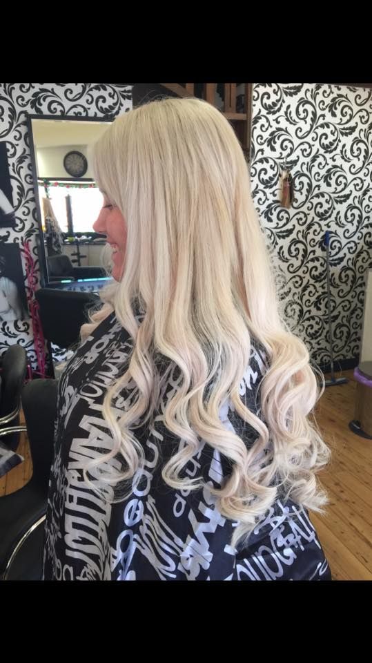 Woman With Long, Wavy, Platinum Blonde Hair in a Salon — Elysian Salon In Toukley, NSW