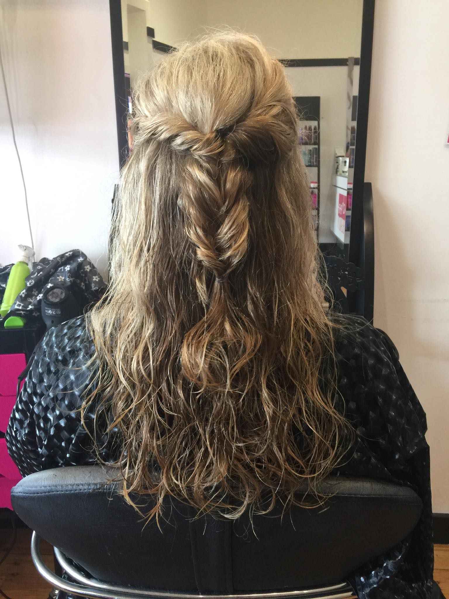Person in a Chair With Long, Wavy Hair Styled With a Braid Down the Back — Elysian Salon In Charmhaven, NSW