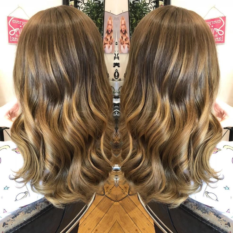 A Reflection of a Womans Hair in a Mirror — Choo Choo Hair and Beauty In Wyong, NSW