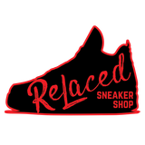 Black sneaker silhouette with red 