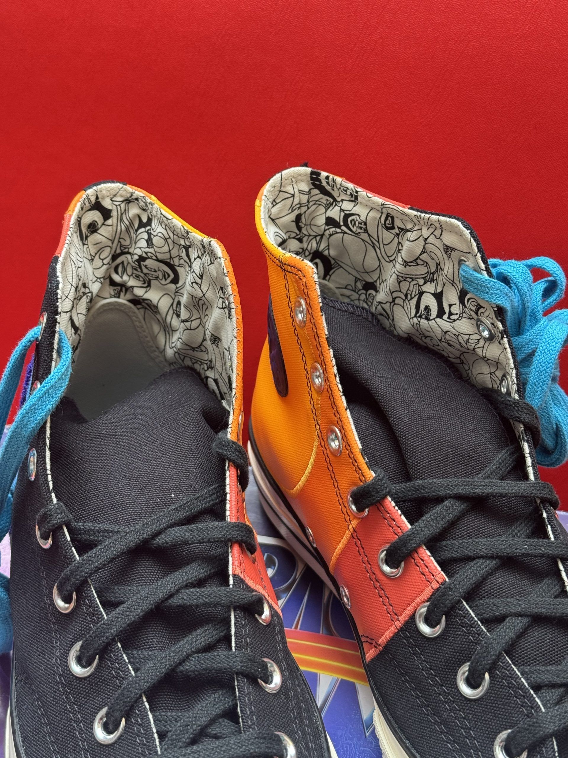 Black Converse Tune Squad sneakers on a box, with a blue Bugs Bunny embellishment.