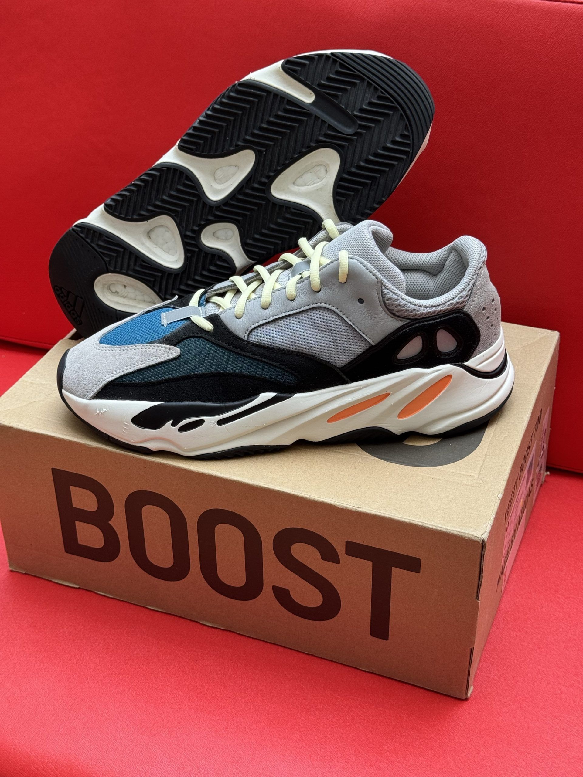 Adidas Yeezy Boost 700 sneakers on a 