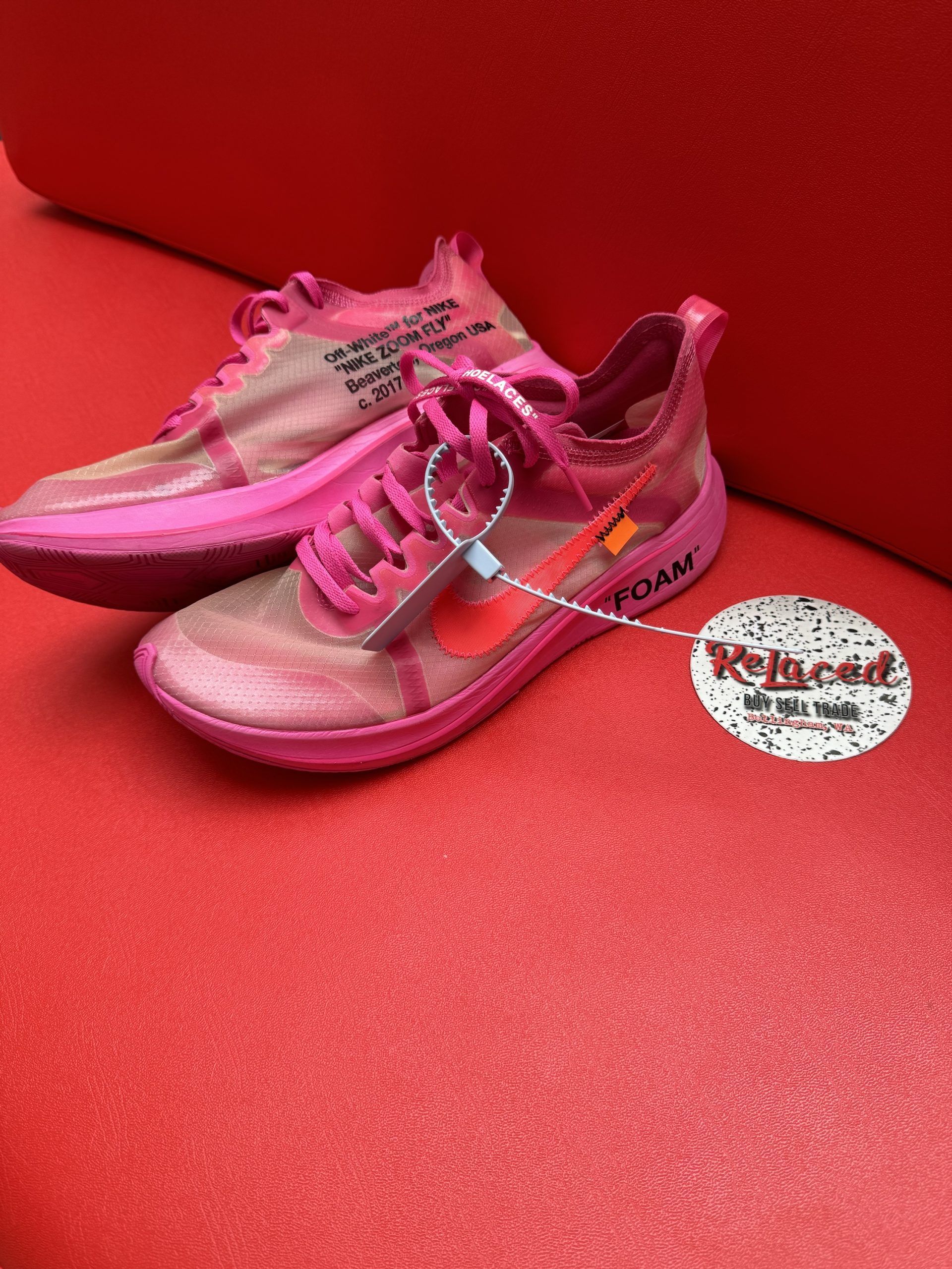 Pink Off-White sneakers with a 