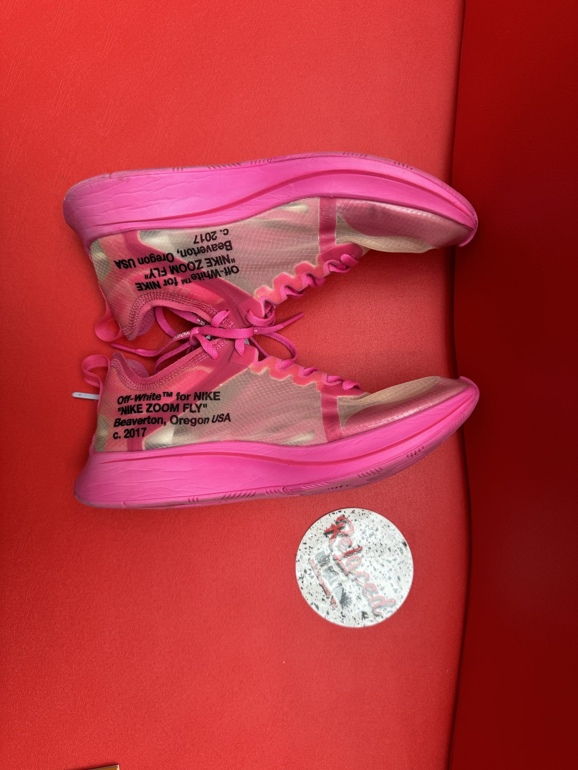 Pink Off-White sneakers with a 