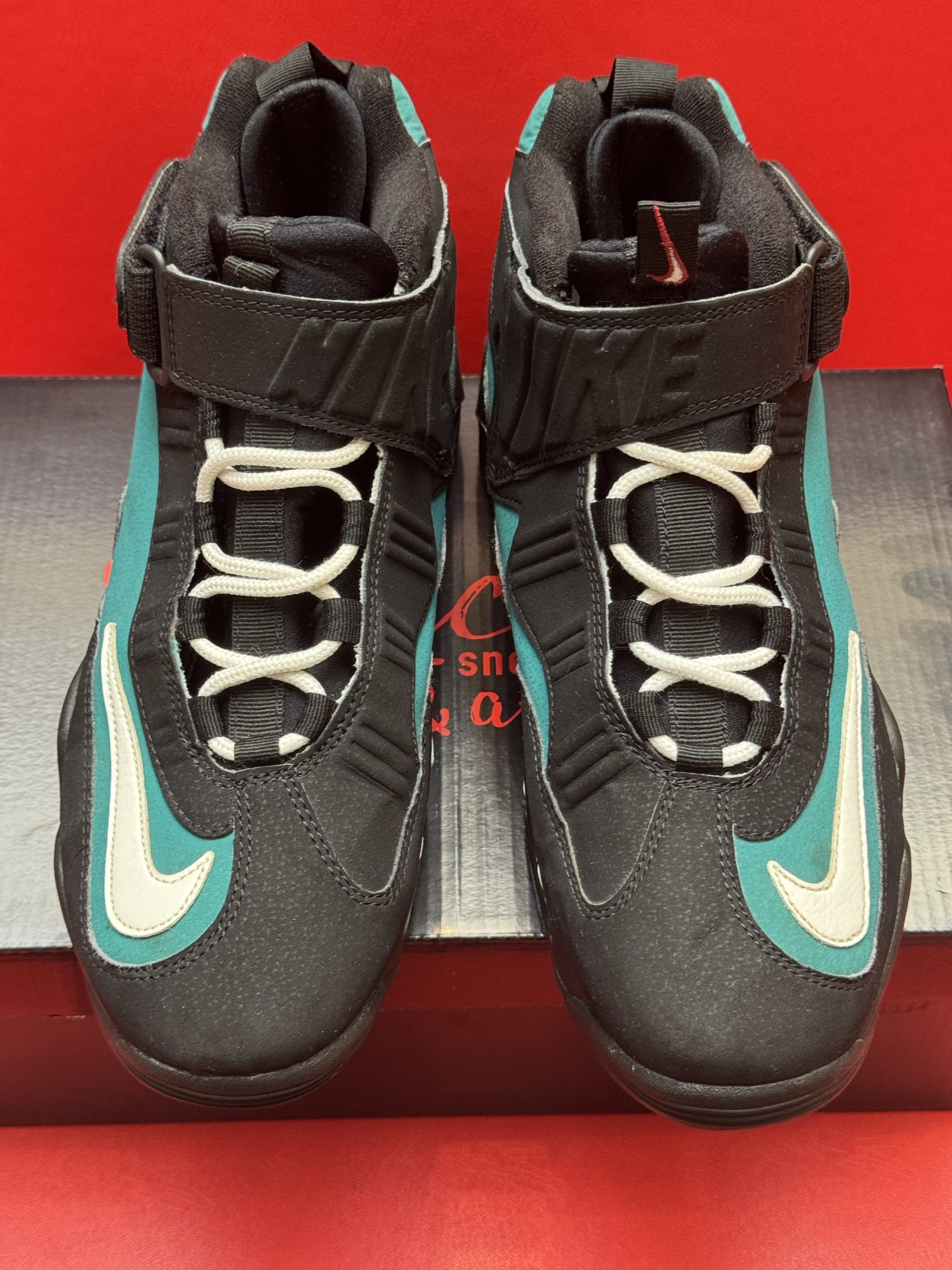Black and teal Nike Air Griffey Max 1 sneakers, with 
