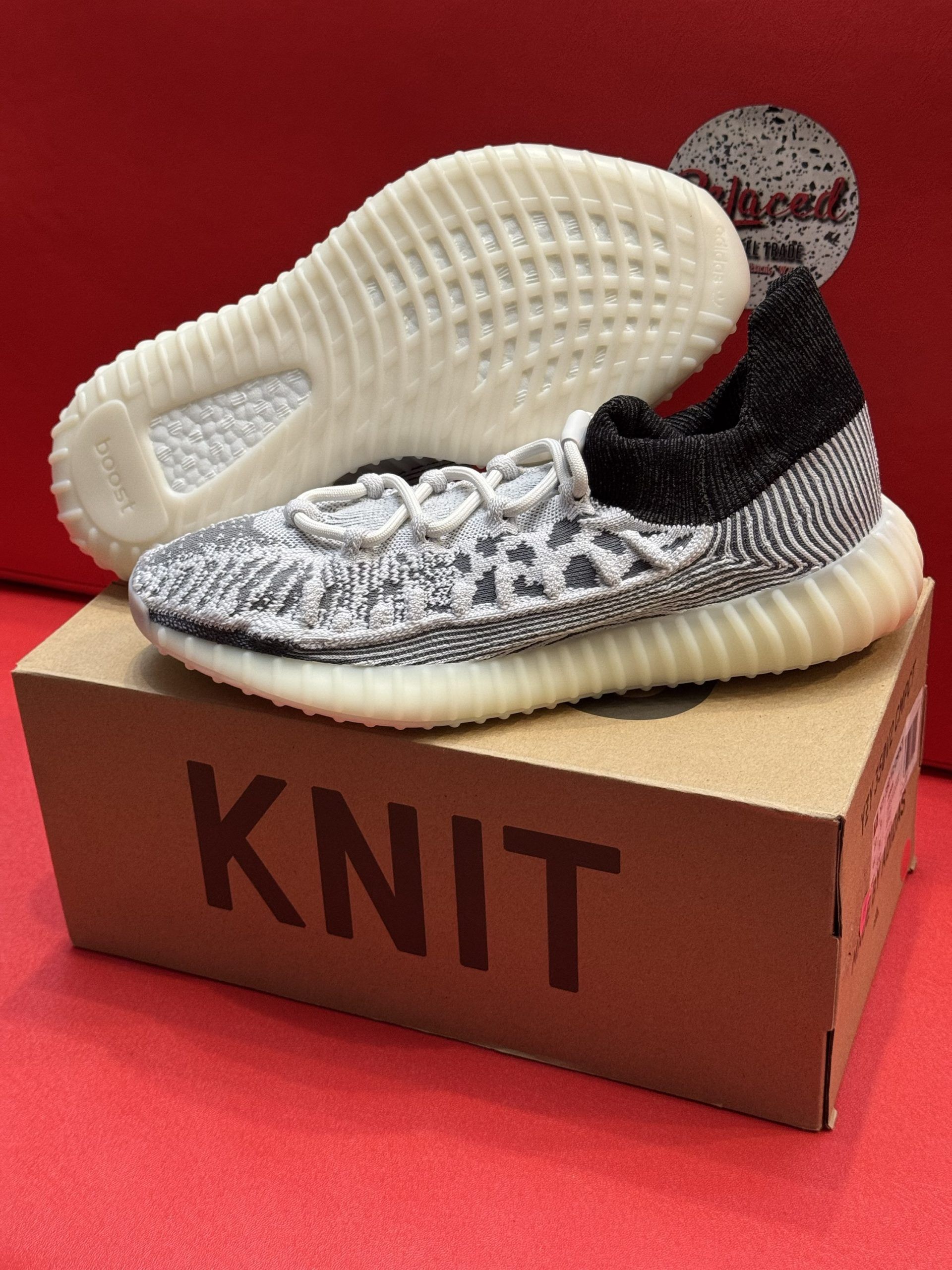 Yeezy Boost 350 V2 sneakers on top of a 