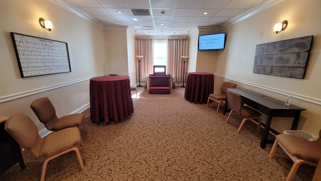 Highland Funeral Home Hallway with Standing Tables and Chairs
