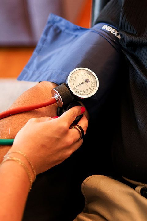 checking blood pressure