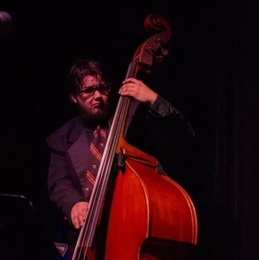 A man playing the chello