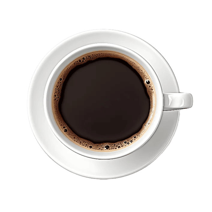 Cup of dark coffee on white saucer, overhead view.