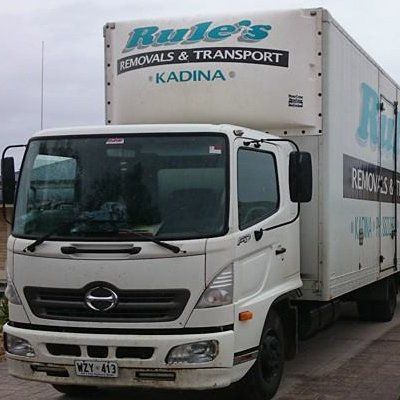 rules removals and transport company truck with goods
