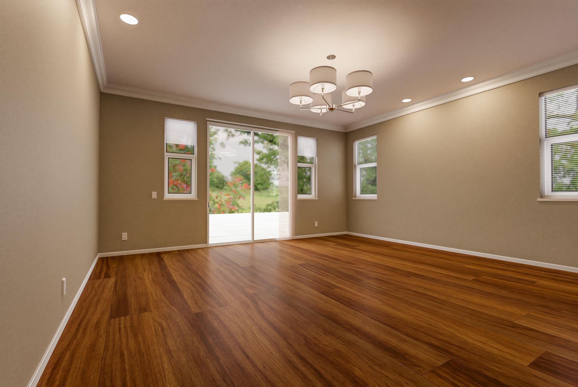 An empty living room with hardwood floors and sliding glass doors.