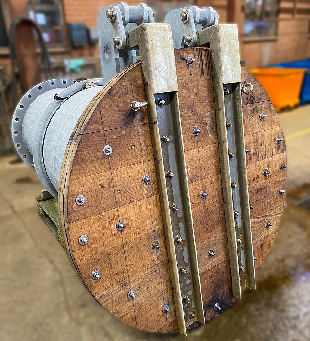 Check Valve designed to fit both the pipes and the building 