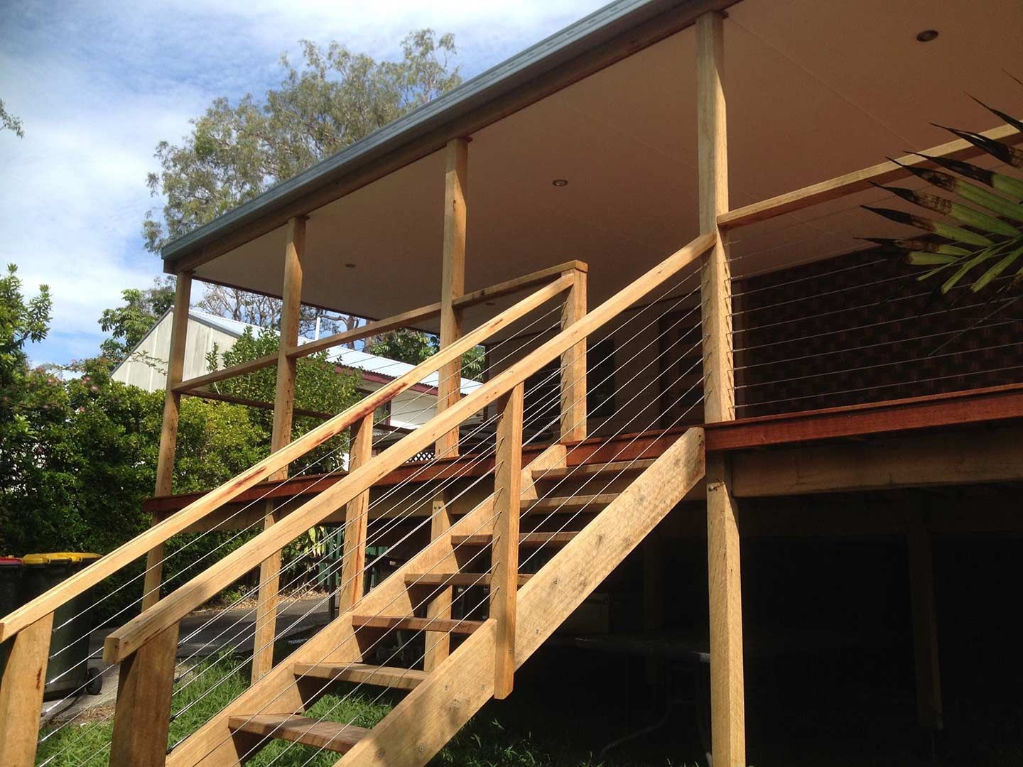 A Wooden Deck With Stairs Leading Up To It — Nambucca Construction In Nambucca Heads, NSW