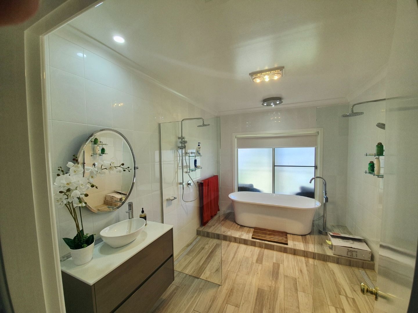 A White House With A Lush Green Lawn In Front Of It — Nambucca Construction In Nambucca Heads, NSW