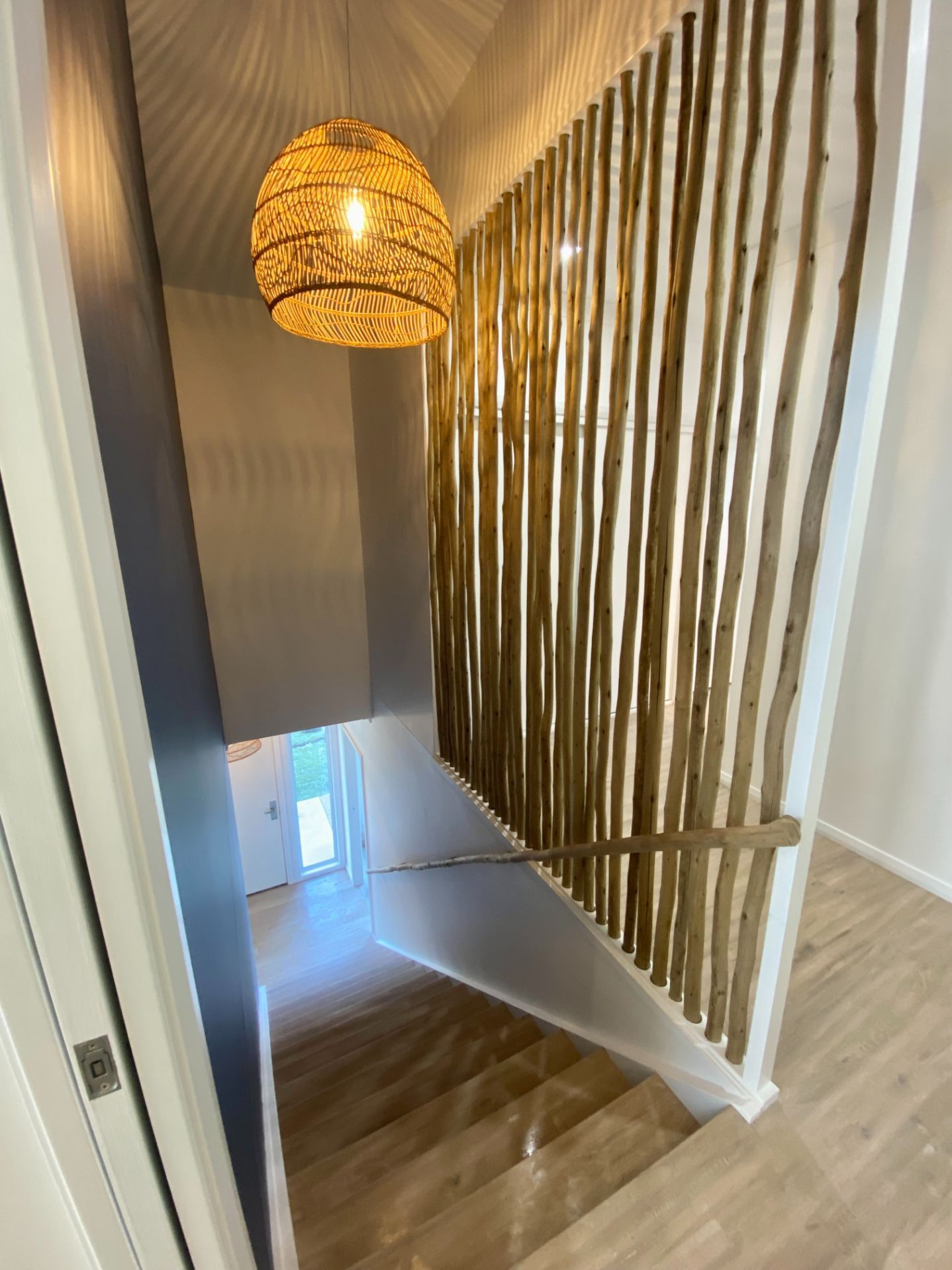 There Is A Large Deck With A Chair On It — Nambucca Construction In Nambucca Heads, NSW