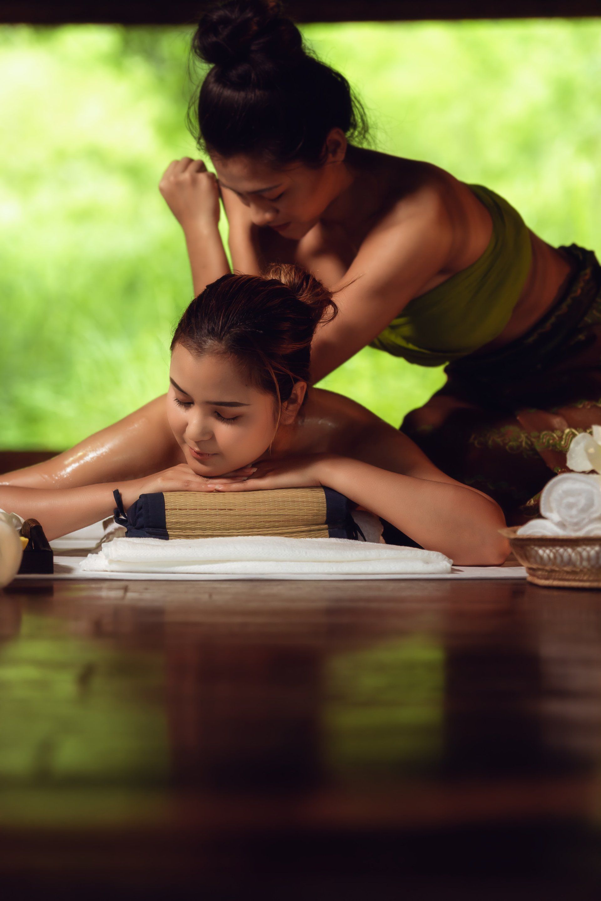 woman getting body massages